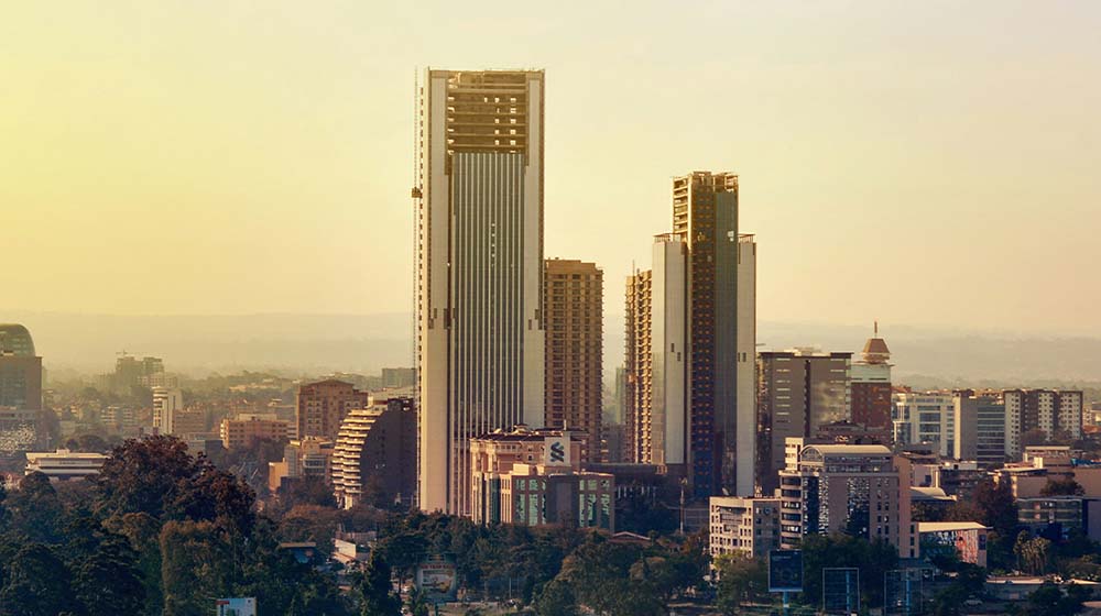 city skyline under white sky during daytime