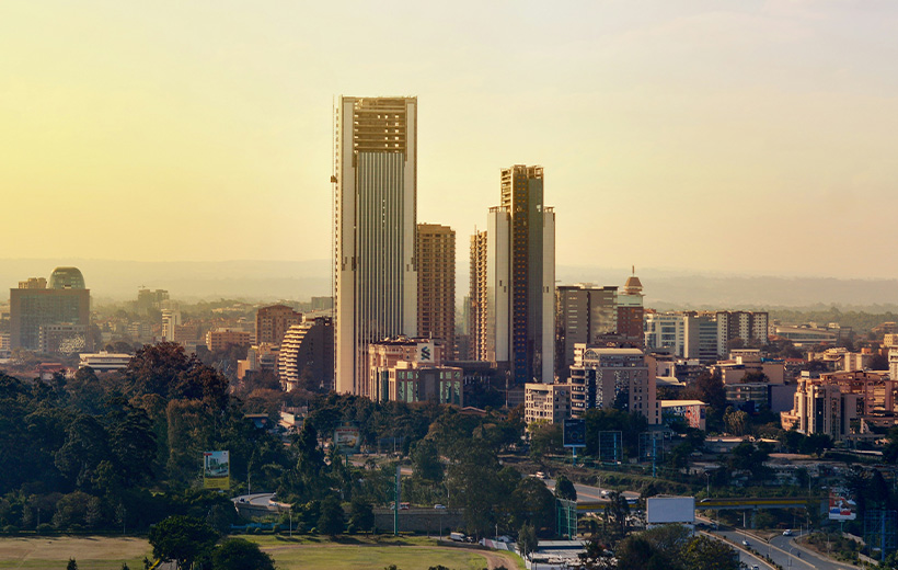 city skyline under white sky during daytime