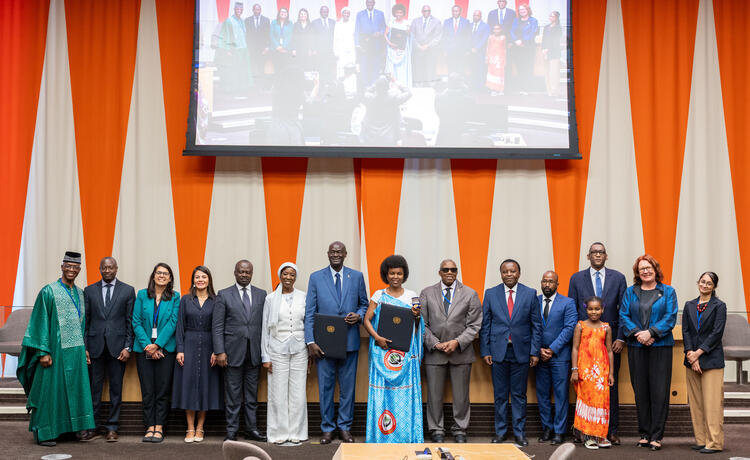  Laureates and committee members gather onstage for the 2026 UN Population Award ceremony.