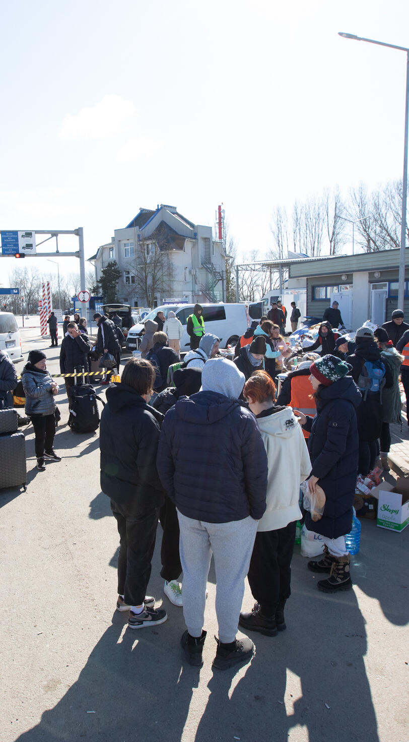 A crowd of people are gathered. 