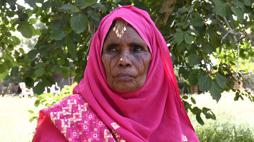  A female advocate for female genital mutilation from Eritrea looking away from the camera.